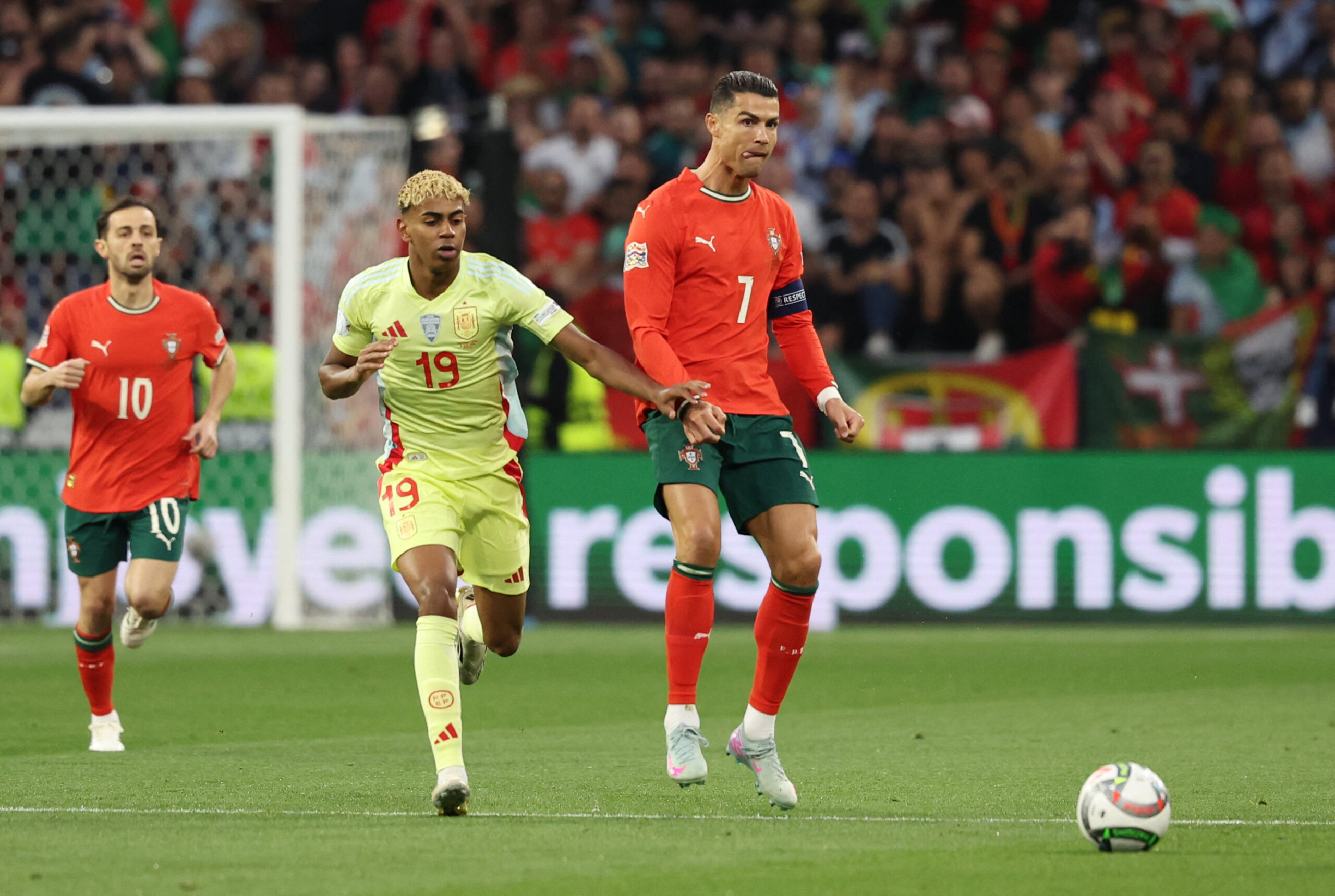 Lamine Yamal in action with Cristiano Ronaldo